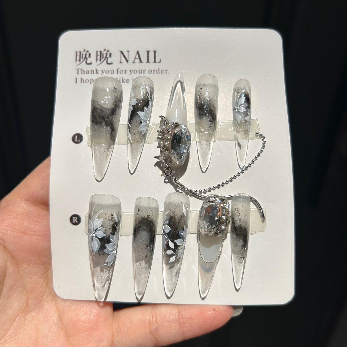 Handmade Ink Wash Black Grey Ombre Long Stiletto Press On Nails with Hand Painted White Flowers, Giant Oval Crystals & Silver Chain Tassels
