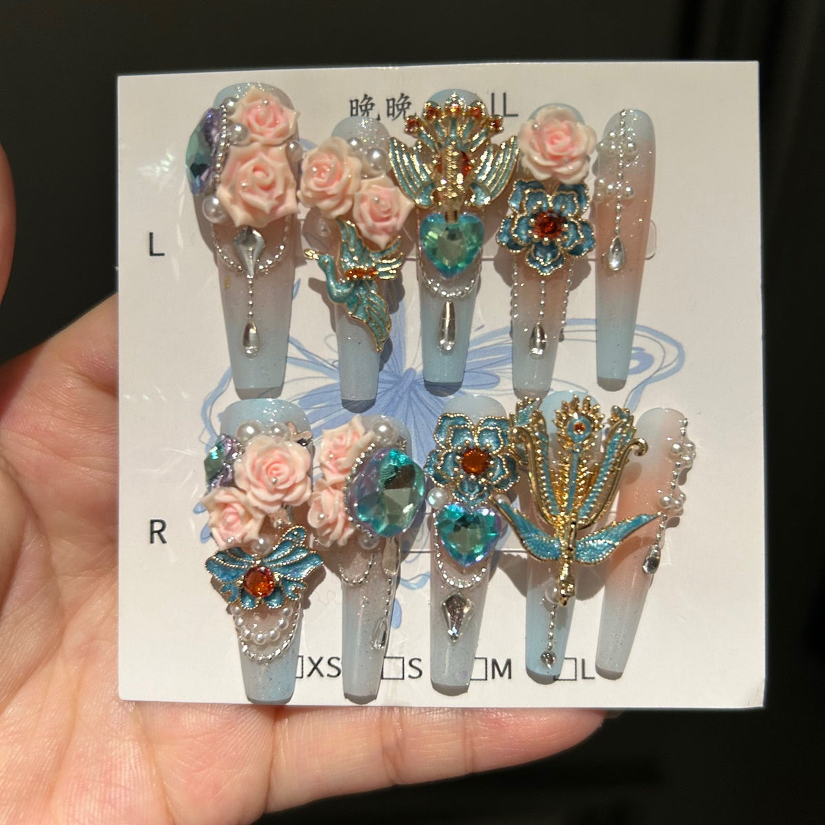 Blue and Gold Gradient Coffin Press-on Nails with 3D Pink Rose, Enamel Peacock Charms, and Hanging Pearl Drops - Oriental Glam Fake Nail Set