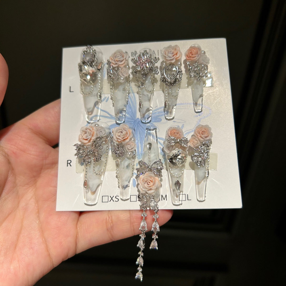 Handmade Clear Marble Long Stiletto Press On Nails with 3D Peach Roses, Silver Rhinestone Butterfly & Bow Charms, Heart Crystals & Dangling Chains