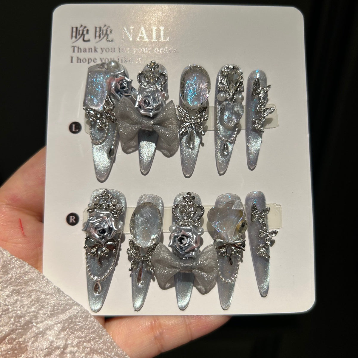 Handmade Silver Cat Eye Long Stiletto Press On Nails with 3D Silver Roses, Crown Charms, Glitter Bow, Butterfly Rhinestones & Pearls
