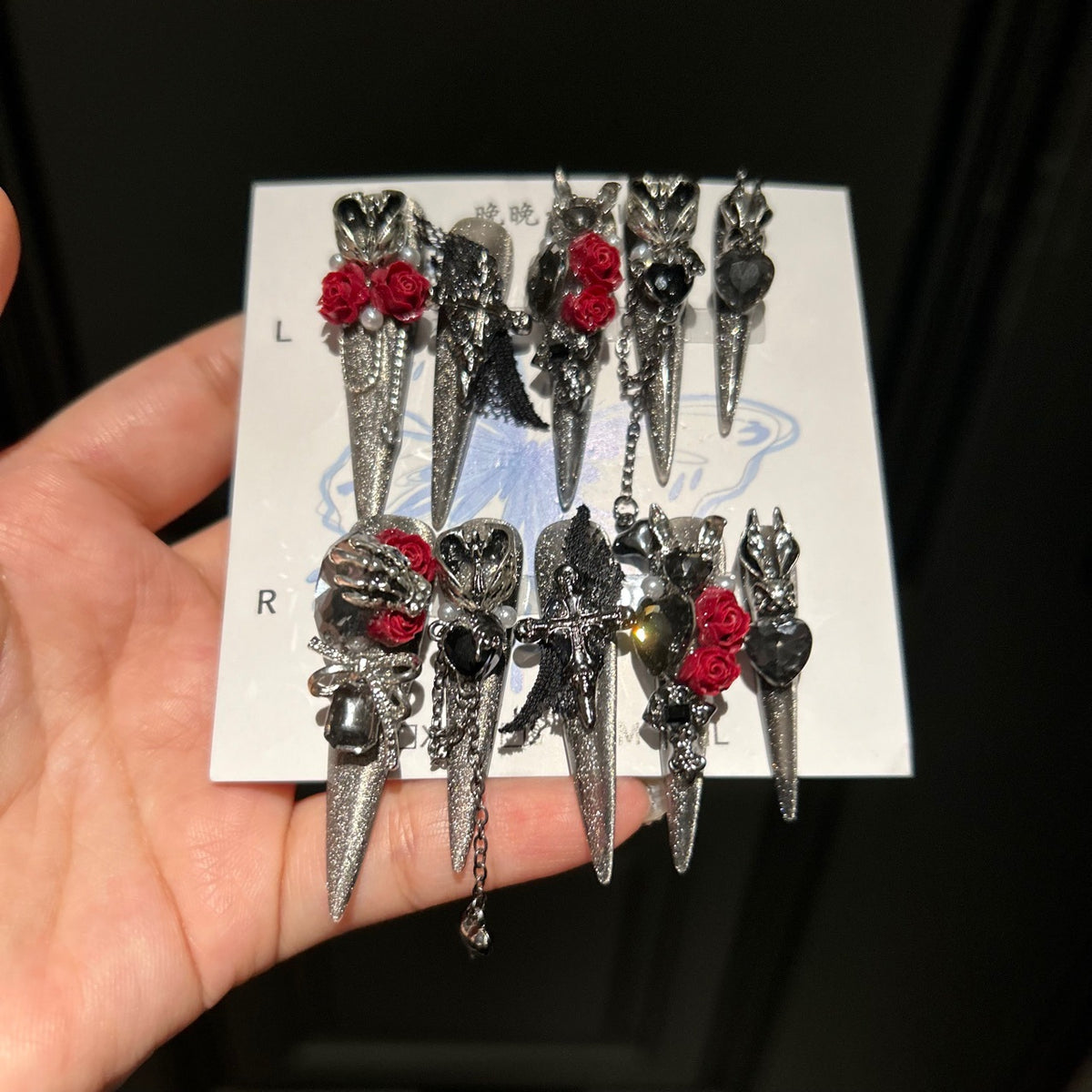 Handmade Silver Glitter Press On Nails, Long Stiletto Gothic Vampire False Nails with 3D Red Roses, Skeleton Hand, Cross & Skull Charms, Black Lace, Pearls, Black Gems & Dangling Metal Chains, Reusable Fake Nails for Cosplay, Halloween & Party