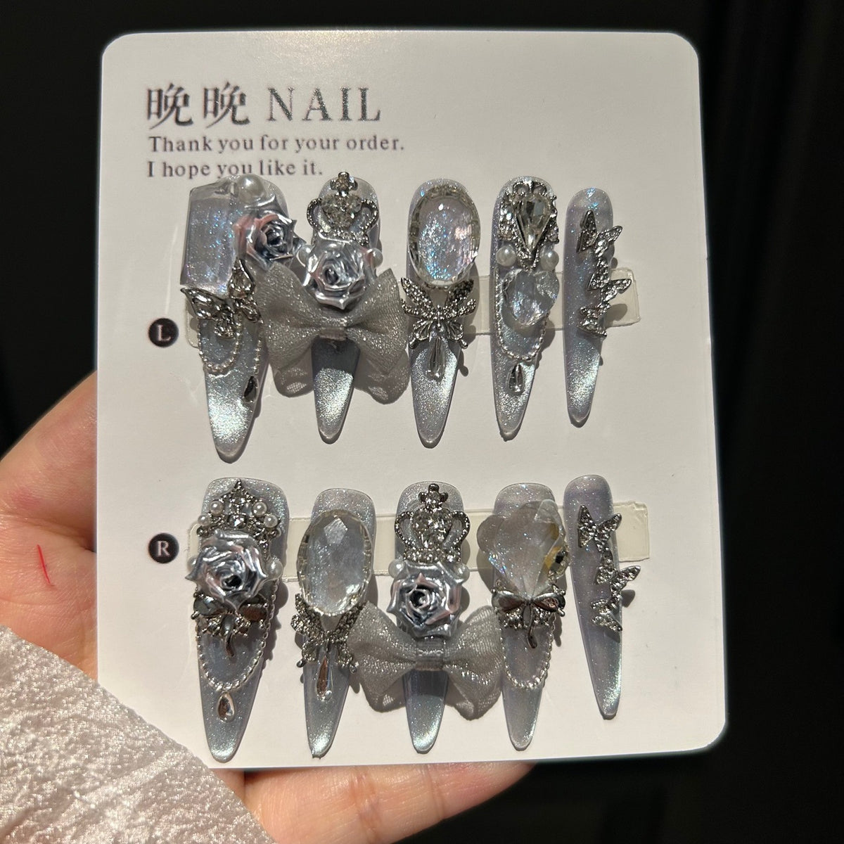 Handmade Silver Cat Eye Long Stiletto Press On Nails with 3D Silver Roses, Crown Charms, Glitter Bow, Butterfly Rhinestones & Pearls