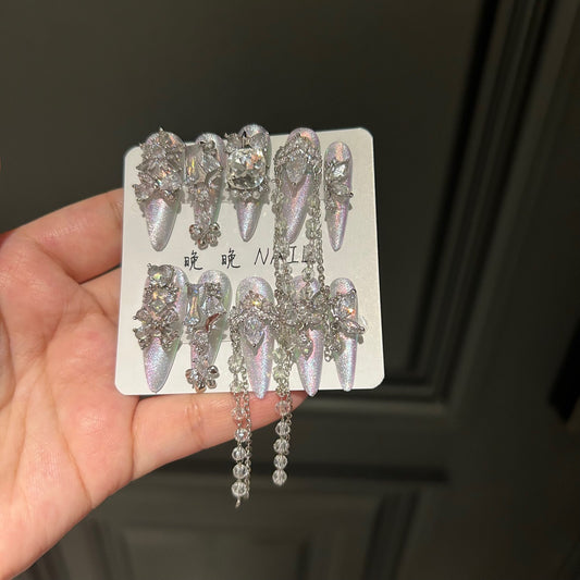 Holographic Silver Cat Eye Stiletto Press-on Nails with 3D Crystal Rhinestones, Over-sized Gem, and Beaded Hanging Chain Charms - Luxury Statement Fake Nail Set