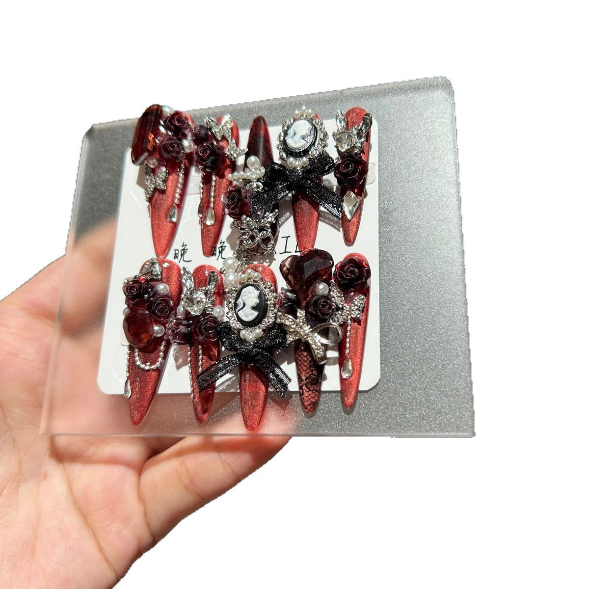Handmade Metallic Red Long Stiletto Press On Nails with Vintage Cameo Portrait, 3D Dark Red Roses, Black Bows, Crystals & Pearl Chain Tassels