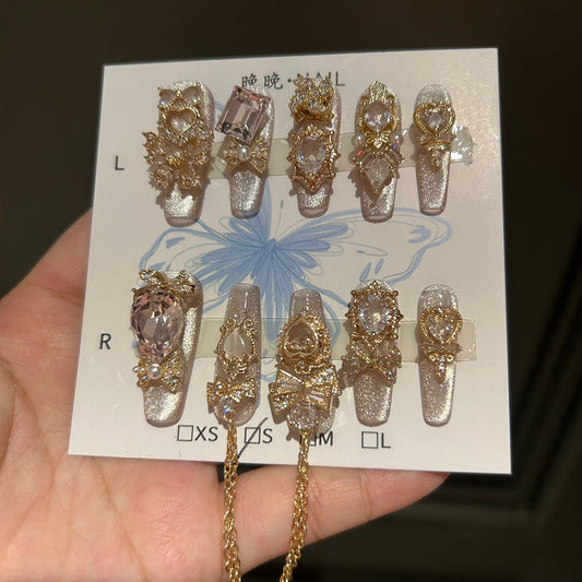 Champagne Silver Cat Eye Coffin Press-on Nails with 3D Bowknot, Crystal Jewels, and Hanging Chain Charms - Luxury Statement Fake Nail Set