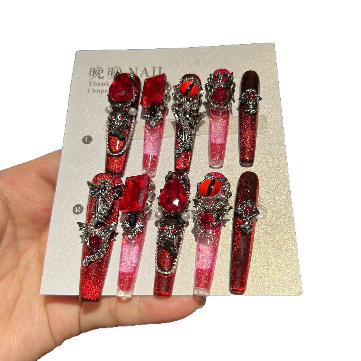 Handcrafted Designer Dark Aesthetic Press-on Nails - Shimmering Red-Black Base with Heavy 3D Gemstones, Skull Art and Cross Decals